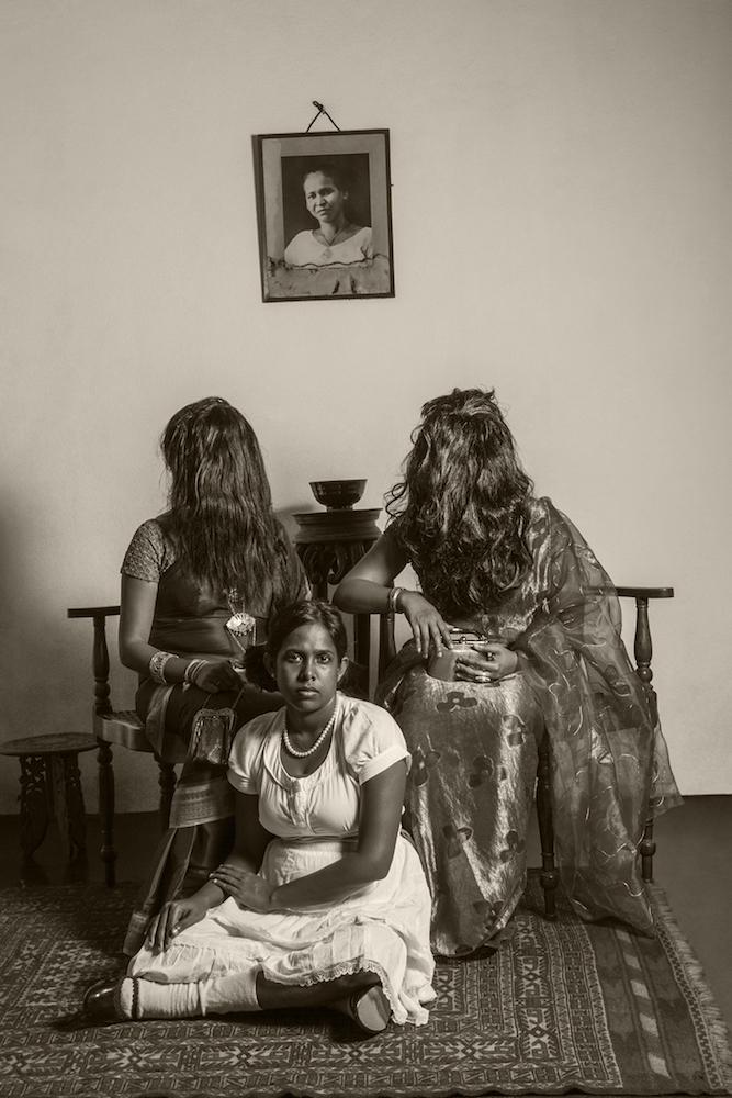 I Let My Hair Loose: Protest Series I. (Photograph by Shirmal Silva. Art Direction by Dilki Perera. Performance by Anoli Perera, Dilki Perera and Lakisha Fernando. Sri Lanka, 2010–11. Ink Jet on Hahnemuhle Gloss Baryta Warmtone Fine Art Paper. 30 × 20 inches.)