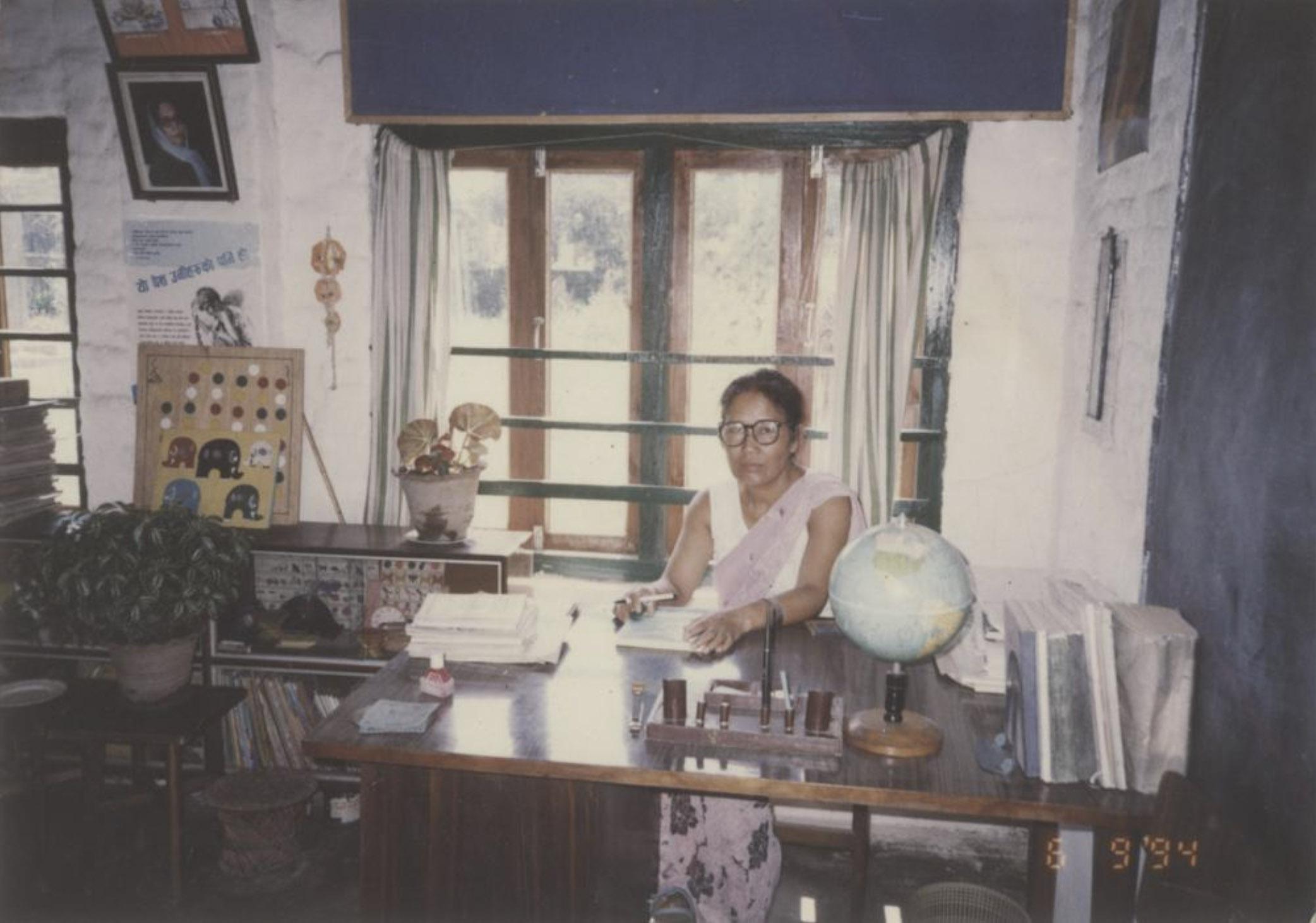 Sukanya Waiba at her desk in Kathmandu, 1994. Waiba is the younger sister of the writer Parijat and the contributor of this archive to Nepal Picture Library.
