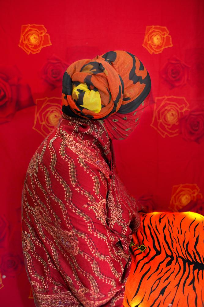 Nowrose’s vibrant portraits follow a visual logic of colour, often using adjacent shades and tints to create differences and similarities between distinct shapes. (From the Series Concealed. Dhaka, 2014–18. Image courtesy of the artist.)